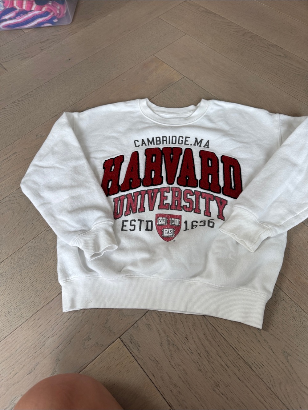 Wesc White Crewneck Sweatshirt with Red Harvard Logo